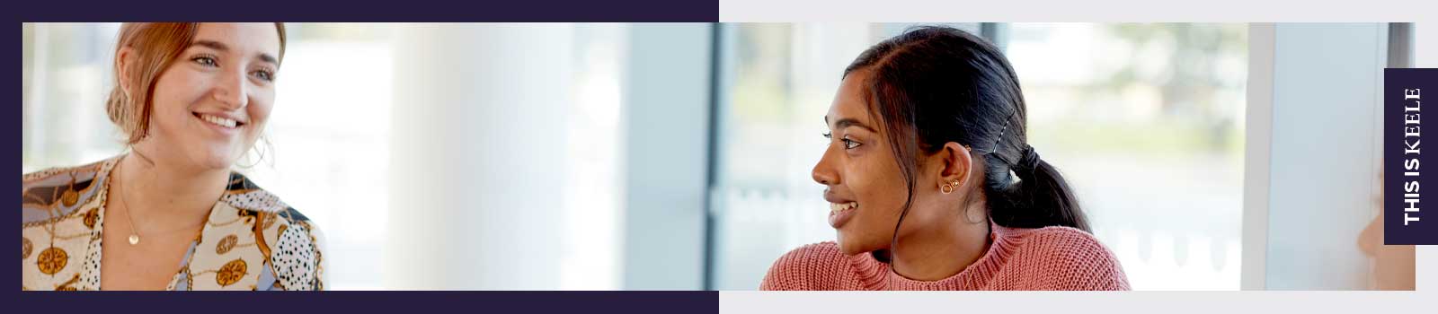 Keele University students smiling in Keele Business School