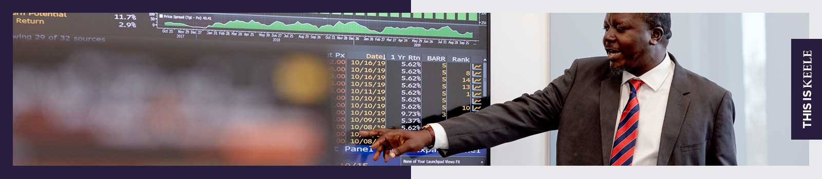 Lecturer teaching Economics in the Bloomberg lab at Keele Business School.